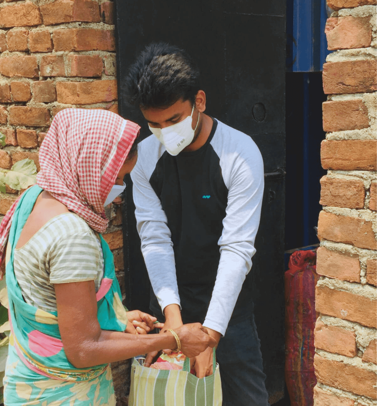 Neighbors bringing food in India