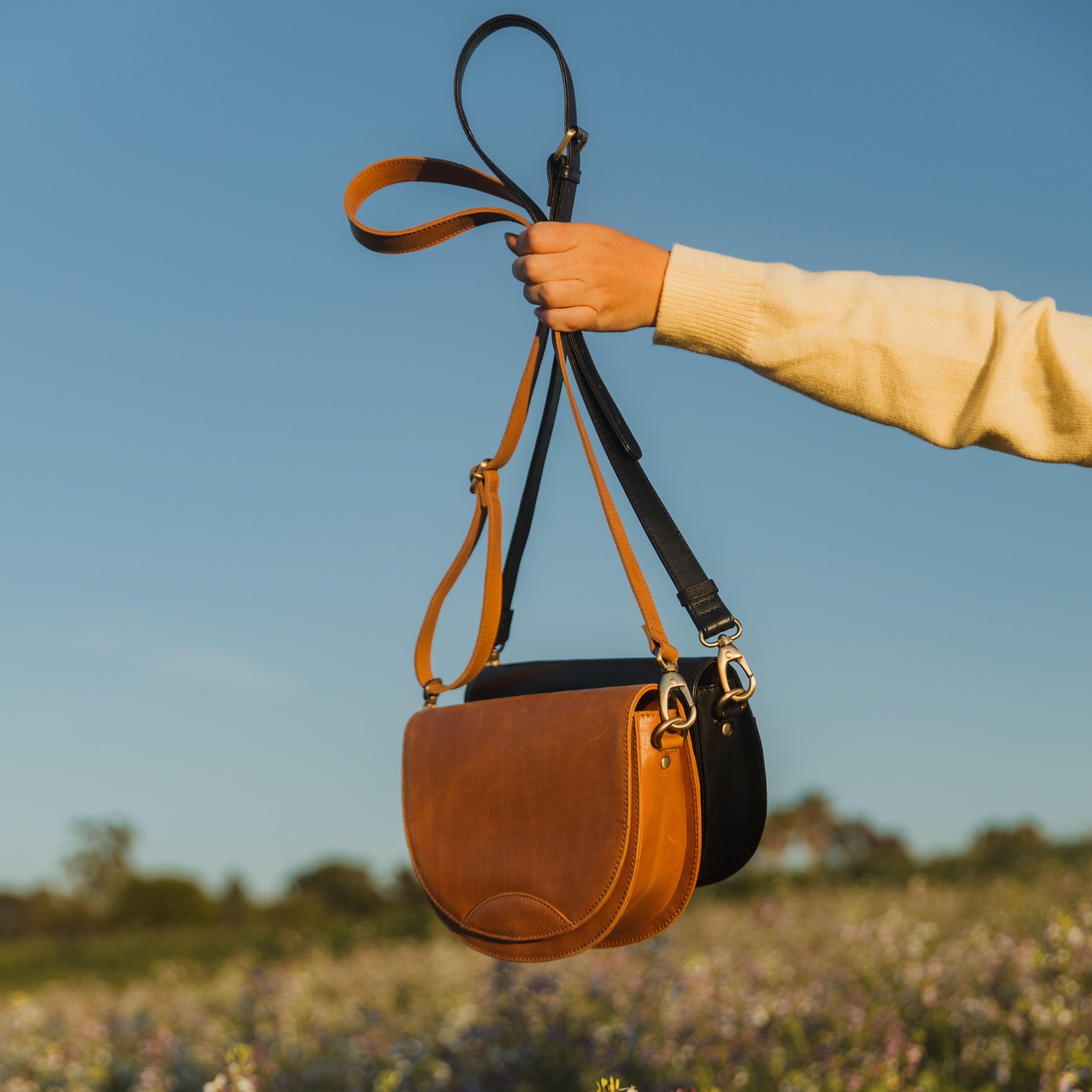 Stella Saddle Bag with a back pocket for quick access, ideal leather saddle bag for on-the-go living.
