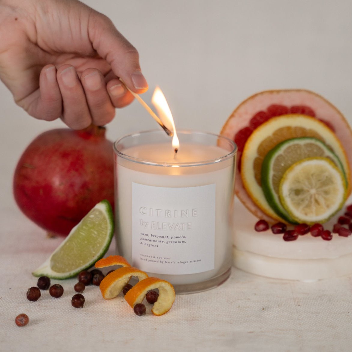 Citrine by Elevate - Aromatic citrus scented candle infused with pomegranate and geranium for a refreshing experience.