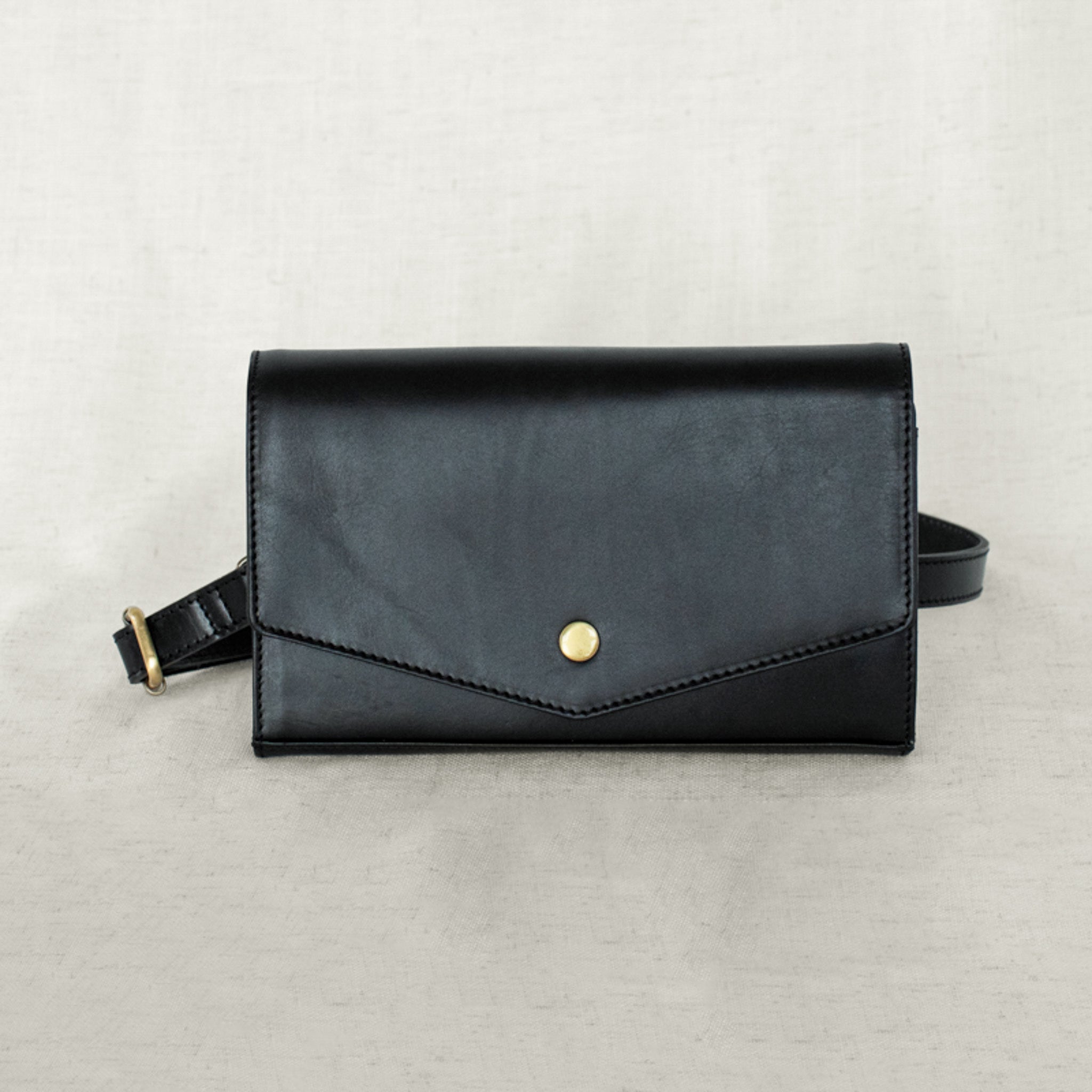 DiMarco Crossbody Bag with Wallet in black leather, featuring a sleek design for stylish everyday use.