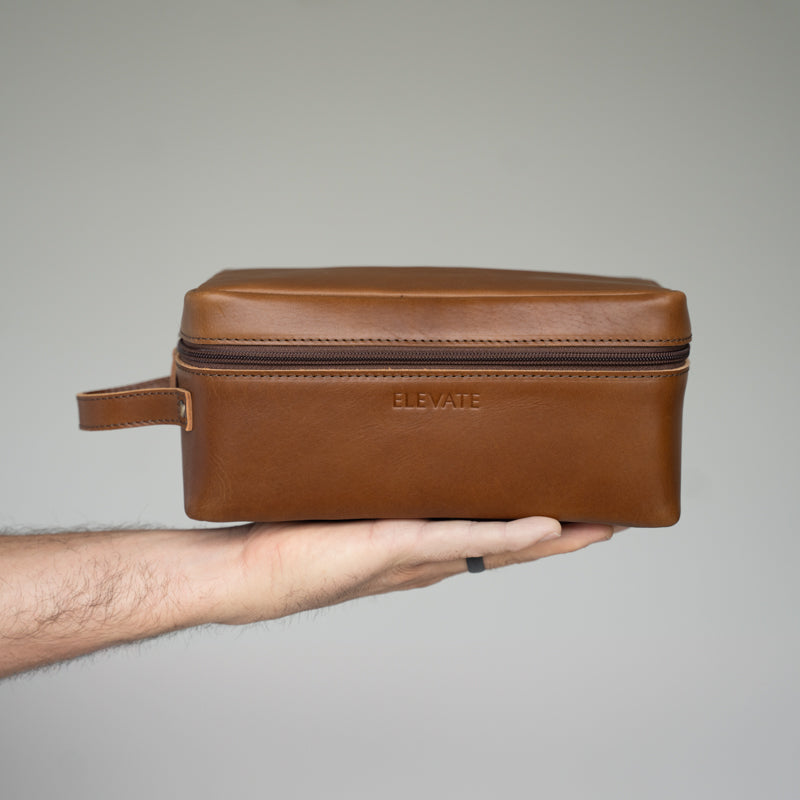 All essentials fitted into the spacious interior of the Leather Doppler Kit, showcasing how a full-grain leather dopp kit can simplify travel.