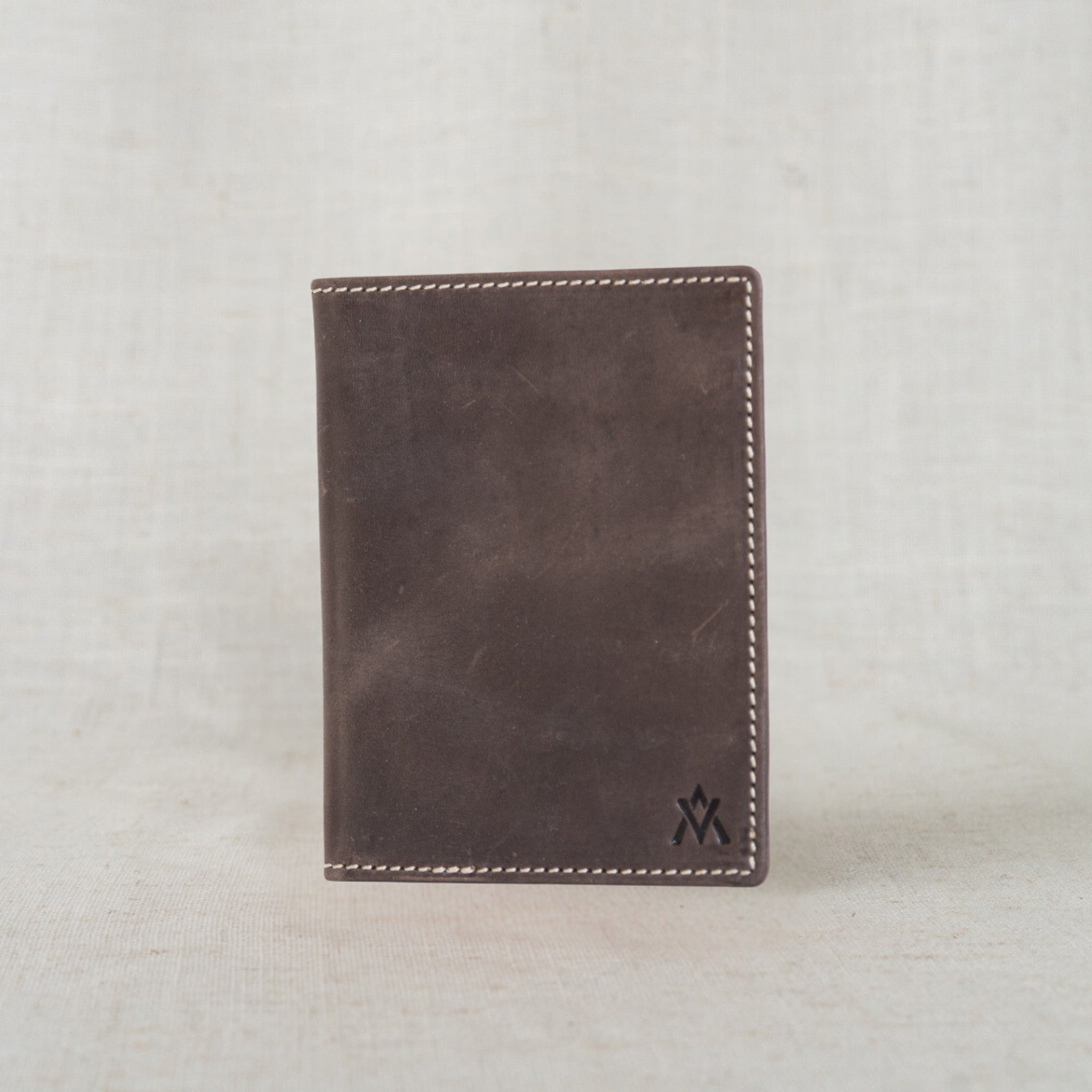 Durable Leather Passport Wallet, designed for adventure, showcasing its rich patina and timeless style.
