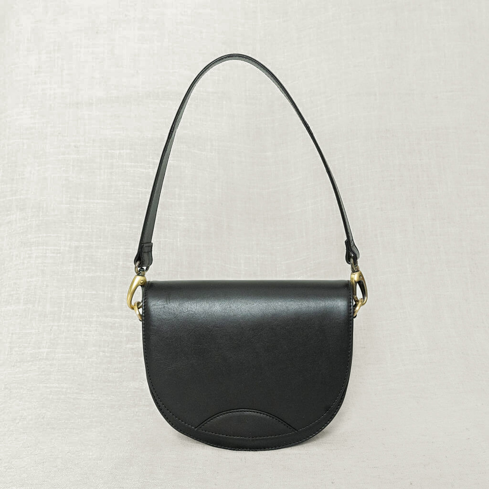 Stella Saddle Bag in premium full-grain leather, a stylish leather saddle bag perfect for everyday use.