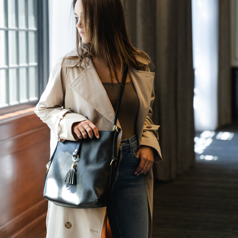 Close-up of Elevate Mini Slingback Bag straps, emphasizing comfort and fit, key features of the versatile mini slingback bag.