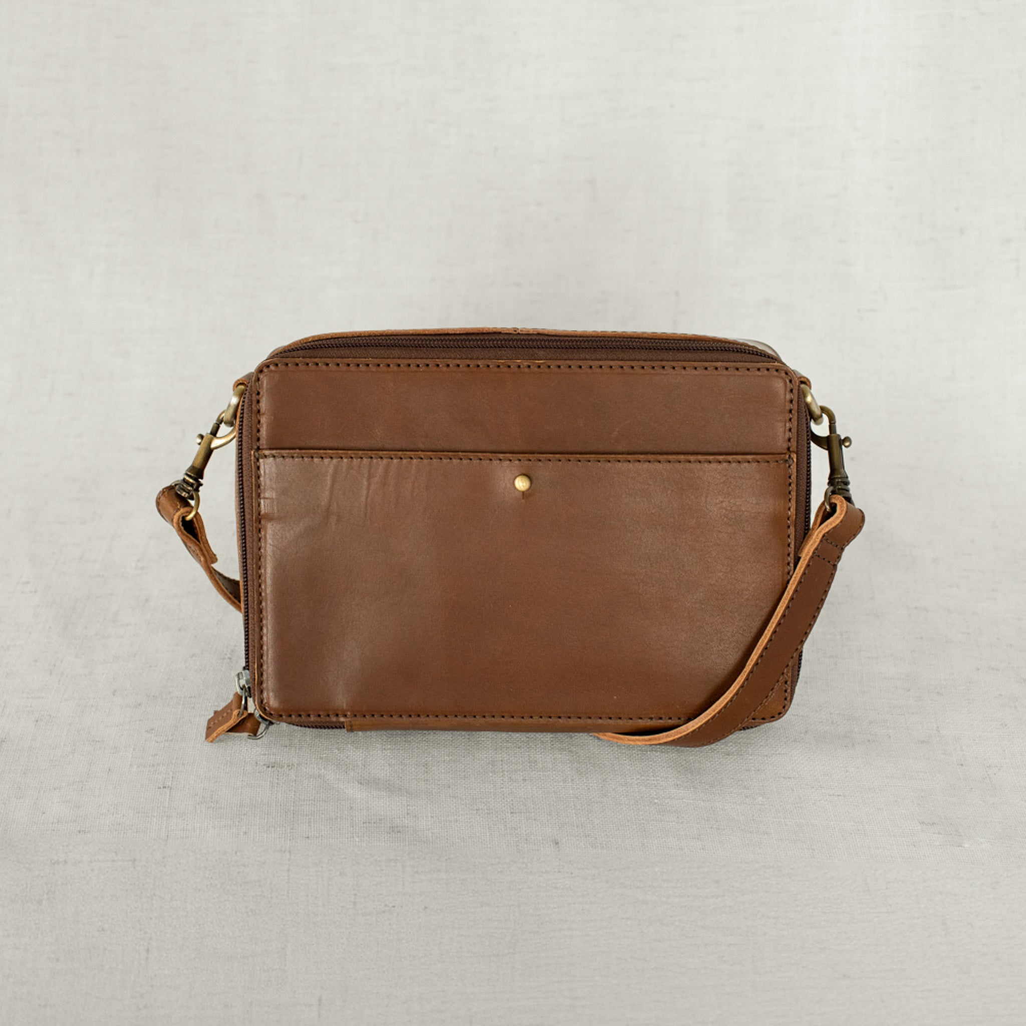 Nomad Crossbody full-grain leather bag in chestnut