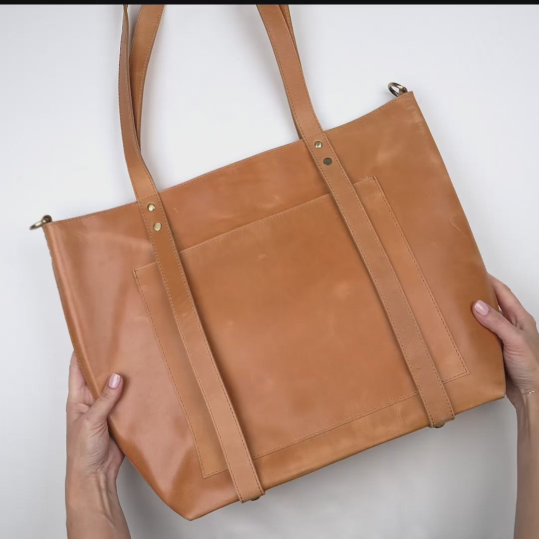 video of the natalie leather travel hat tote being displayed
