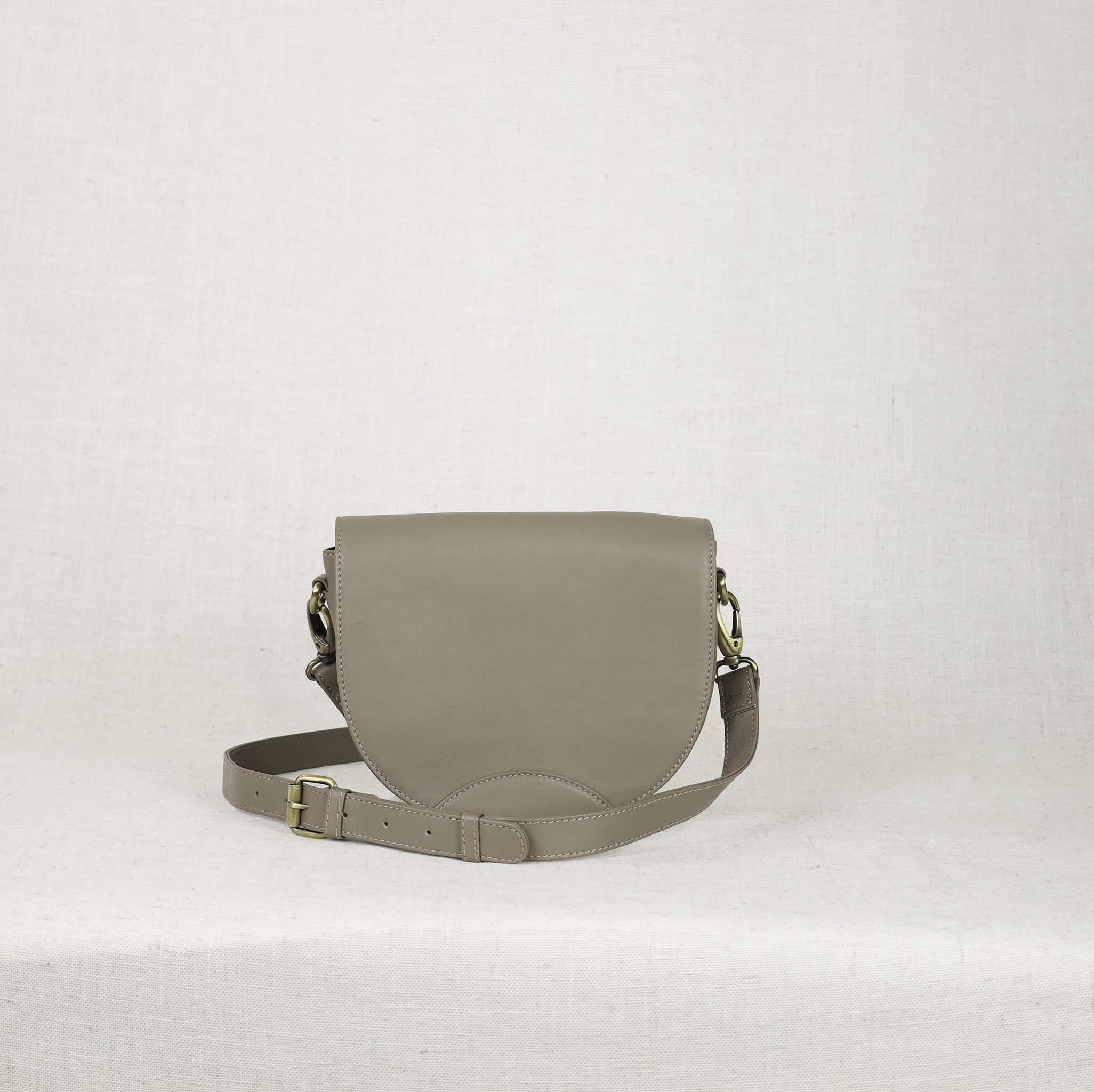 Close-up view of the Stella Leather Saddle Bag with detailed stitching, highlighting the quality of the premium full-grain leather.