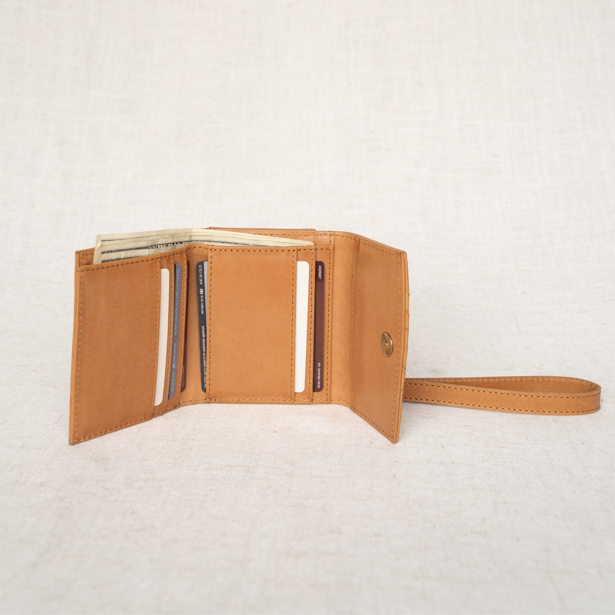 Stylish Suri Woven Leather Wallet in use, perfect for everyday outings.