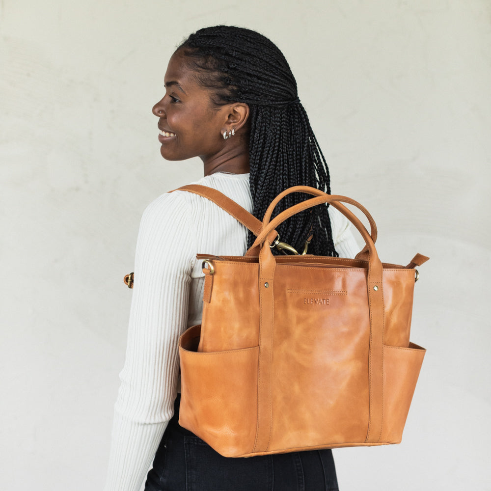 Woman wearing Utility Tote by Elevate as a backpack