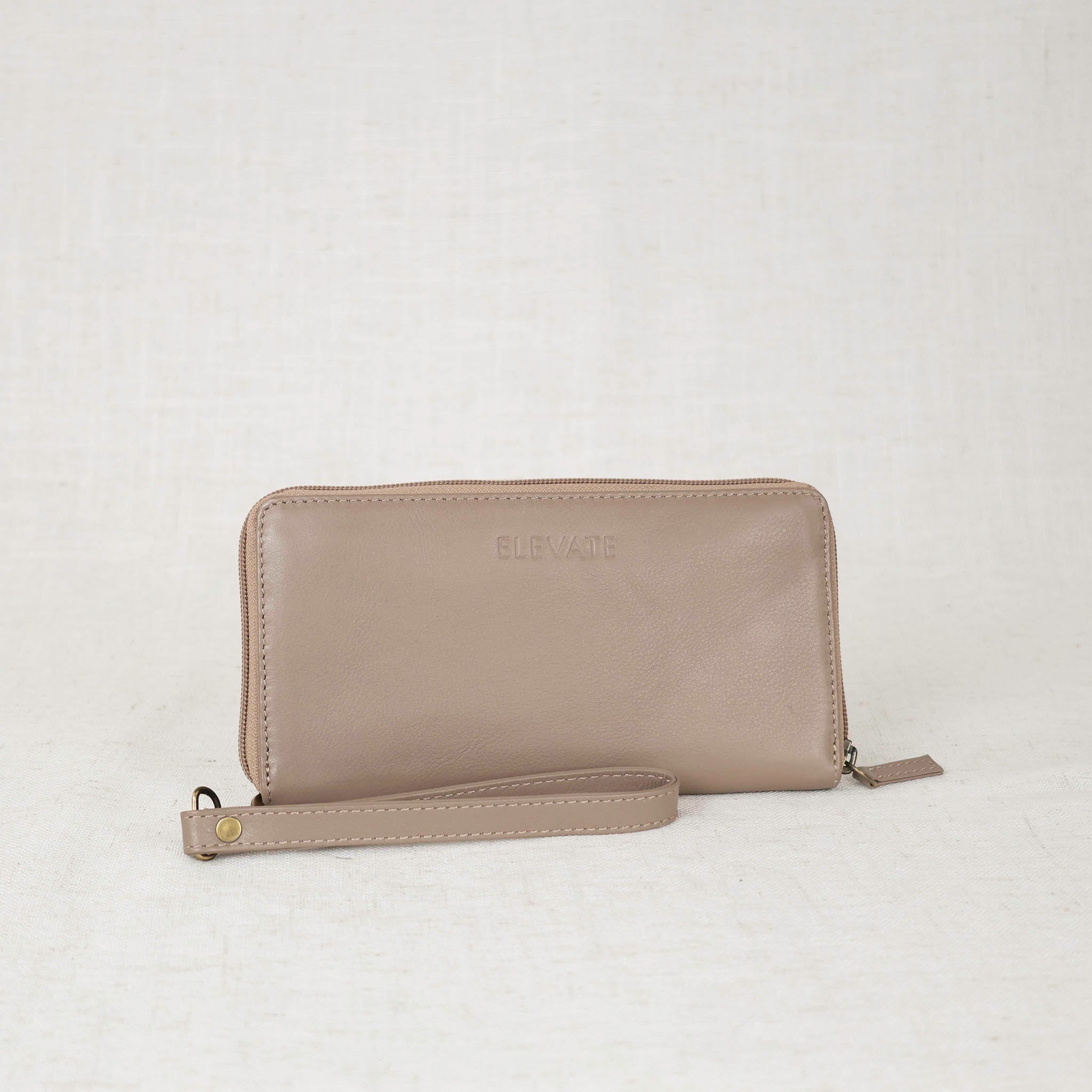 zipper wallet front view in taupe color leather on white background