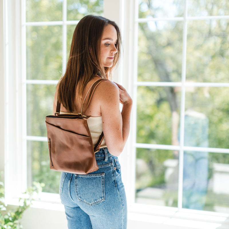Woman wearing Sojourner Backpack by Elevate 
