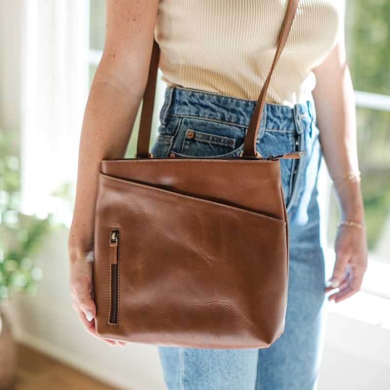 Closeup of woman with Sojourner Backpack by Elevate