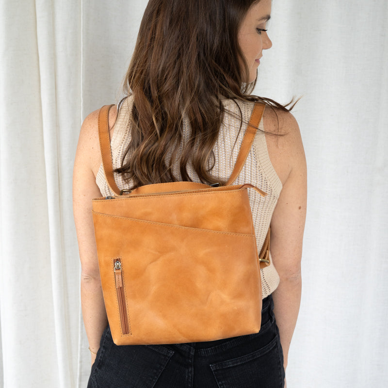 Woman wearing Sojourner Backpack by Elevate 