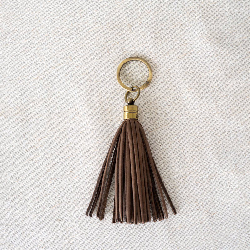 Tassel Keychain by Elevate on linen