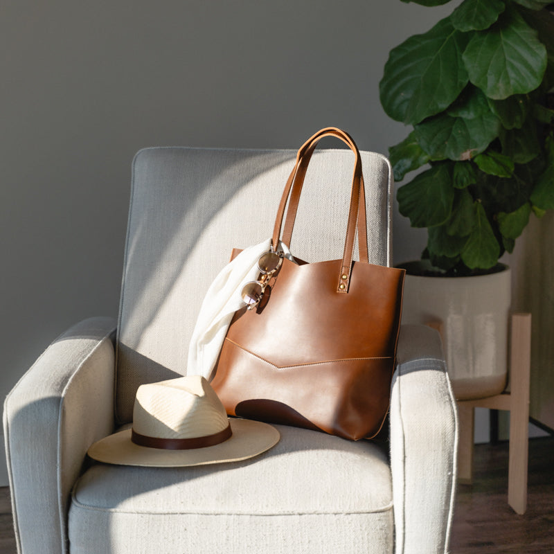 Travelers Tote by Elevate on chair