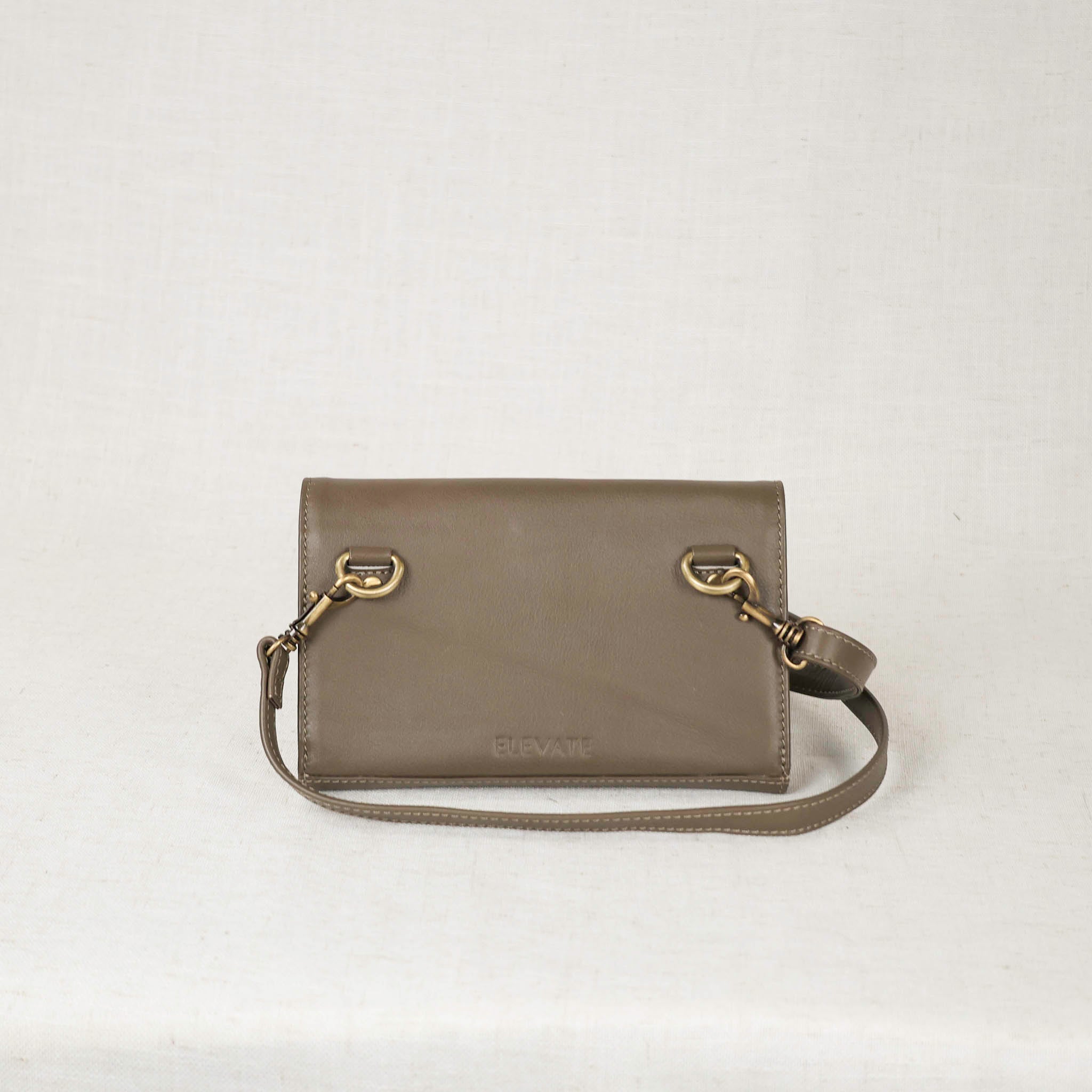 dimarco crossbody in moss colored leather showing the back view