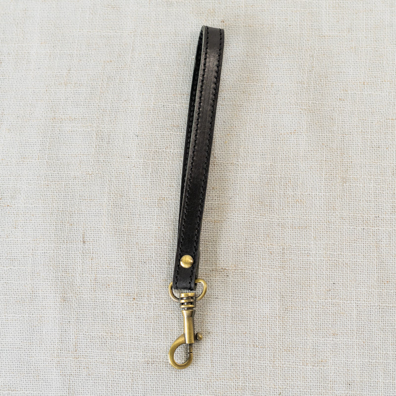Leather Wristlet Lifestyle Image - Capturing the essence of the handcrafted leather wristlet in everyday use.