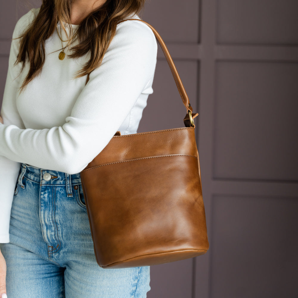 Interior view of The Newport Tote, showcasing its spacious design as a practical leather bucket tote bag.