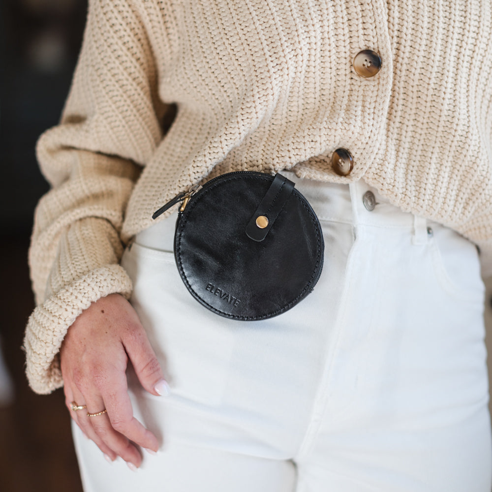 Close-up of a leather coin purse, illustrating premium quality and sophisticated design.