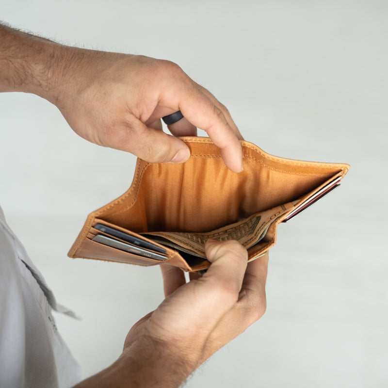 Titus Mens Leather Tri-Fold Wallet displayed elegantly, representing timeless style and craftsmanship for the modern man.