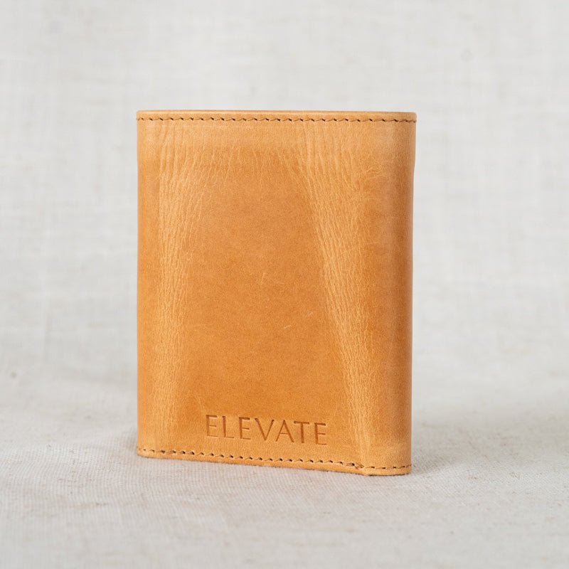 Titus Mens Leather Tri-Fold Wallet outside view, showcasing its sleek design and versatility in everyday carry.