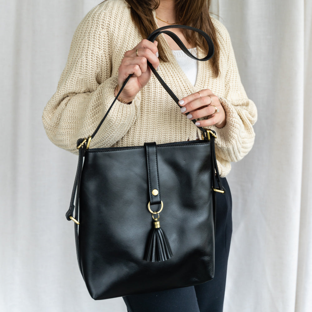 Elevate Mini Slingback Bag with a scenic backdrop, showcasing its stylish appeal and practical design as a mini slingback bag.