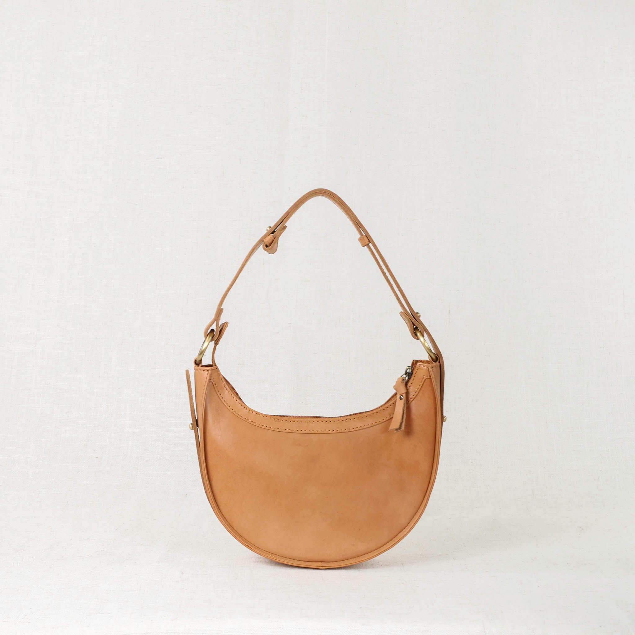 Priya Crossbody 3-in-1 Leather Crossbody Bag showcasing its elegant design and premium genuine leather craftsmanship.