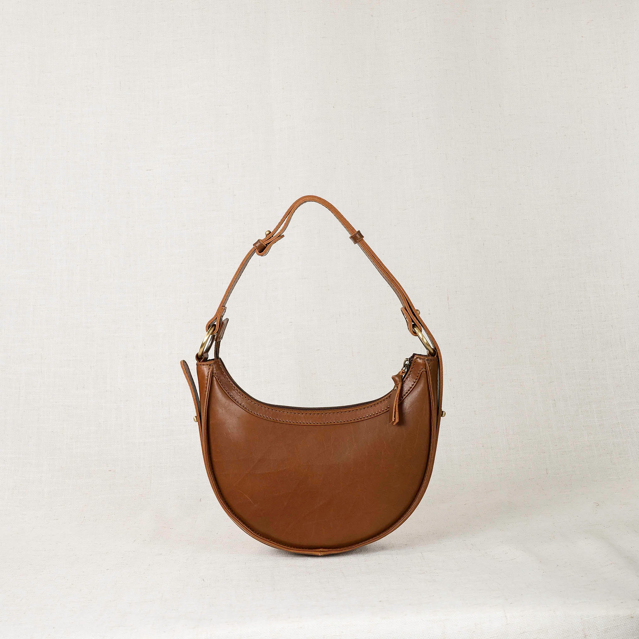 Priya Crossbody 3-in-1 Leather Crossbody Bag highlighting its spacious interior and multiple compartments.