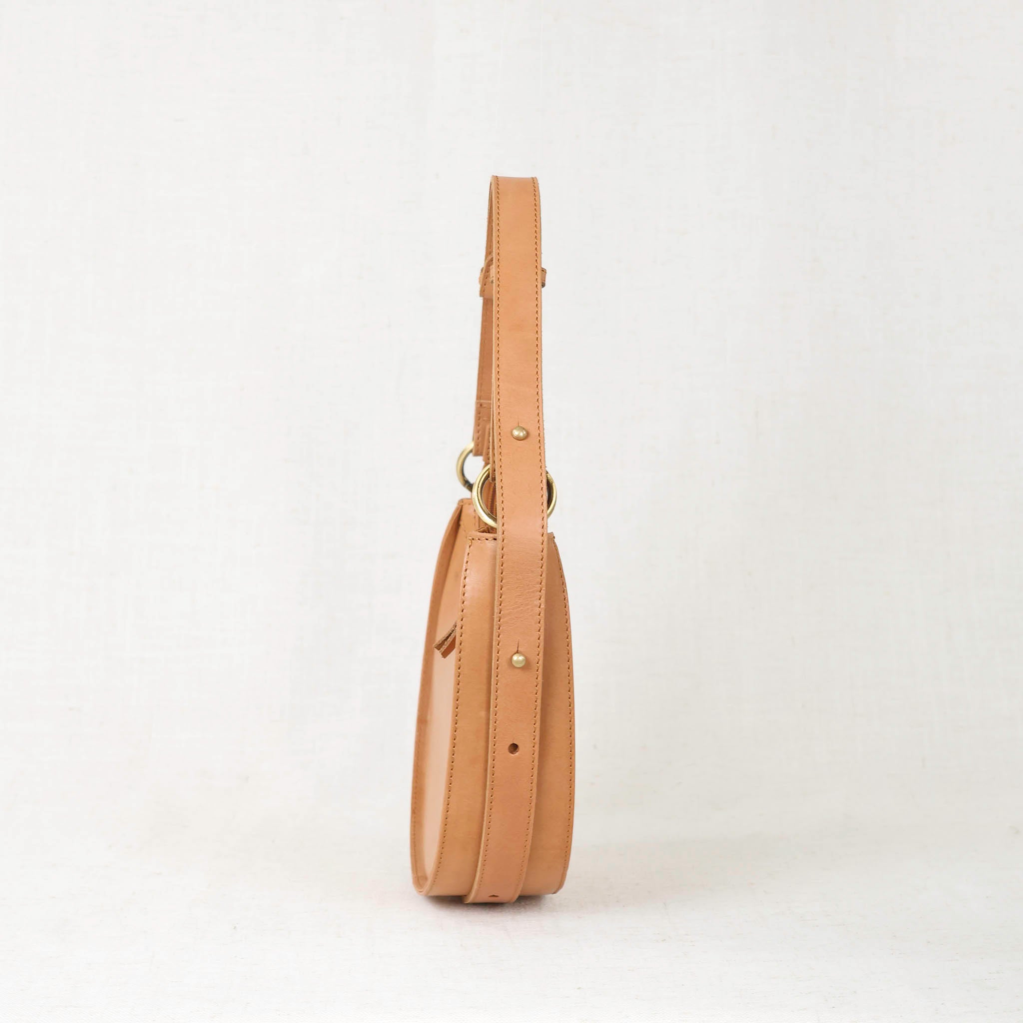 Priya Crossbody 3-in-1 Leather Crossbody Bag featuring a smooth finish and stylish silhouette.