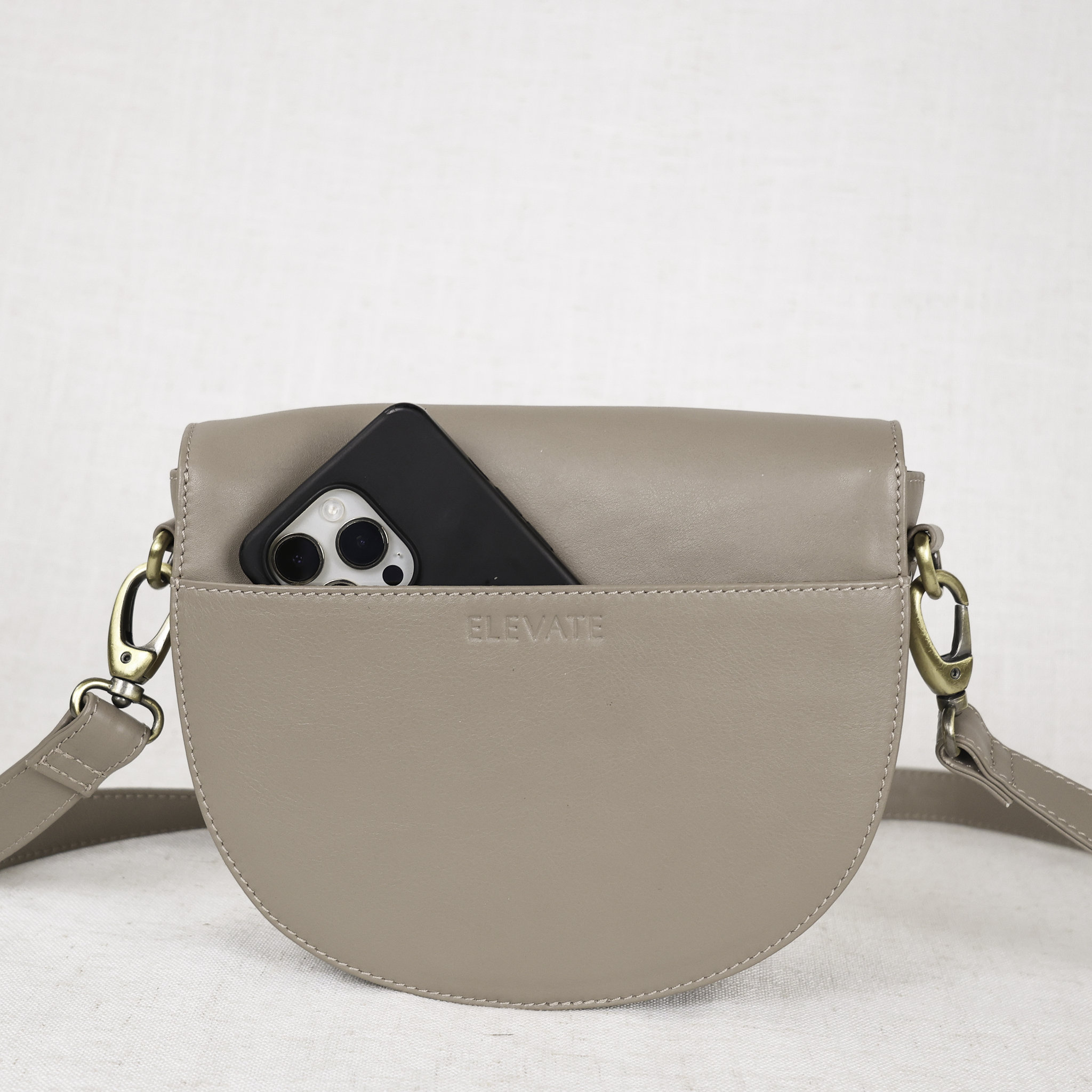 Stella Leather Saddle Bag in a casual setting, demonstrating its versatility as a stylish leather saddle bag for everyday use.