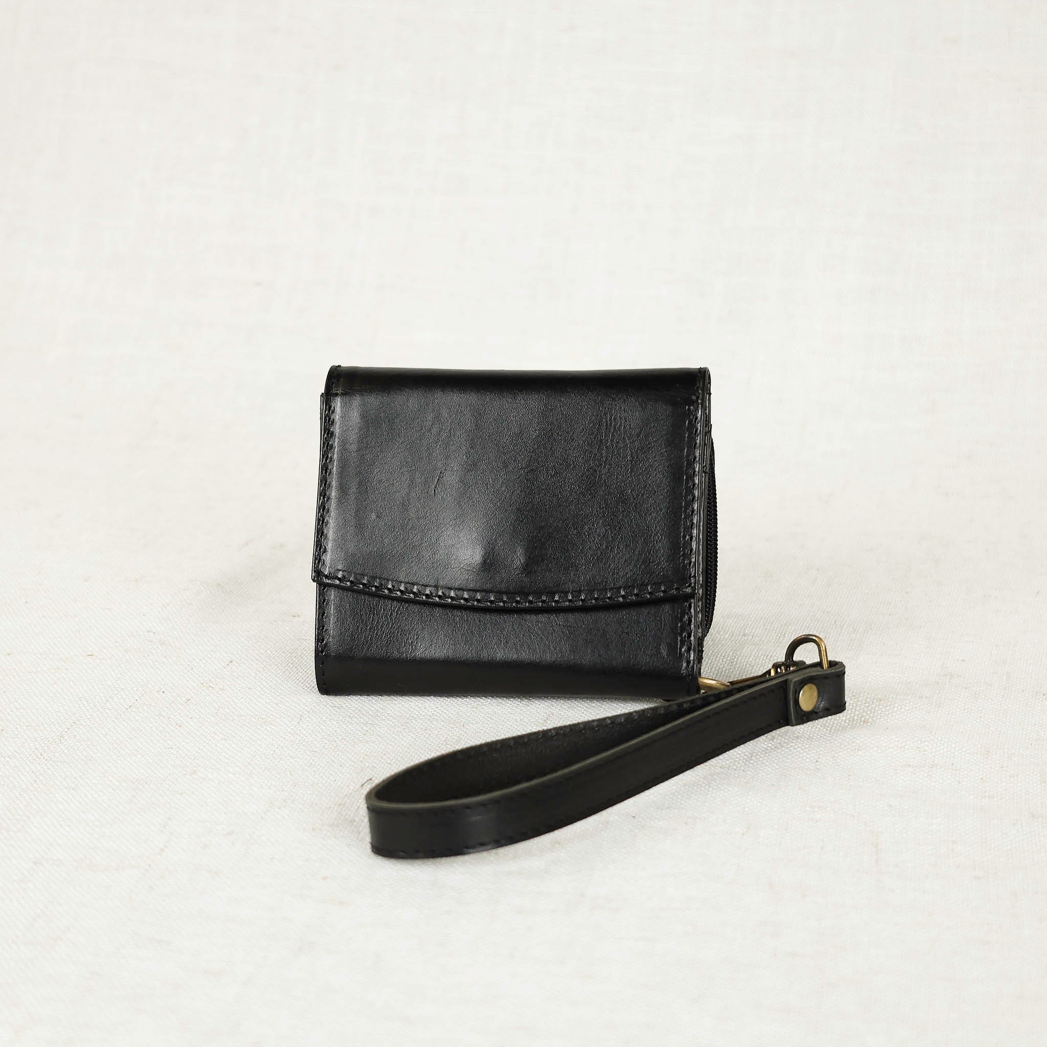 Suri Wallet displayed in multiple colors, ideal for women looking for chic leather wallet options.
