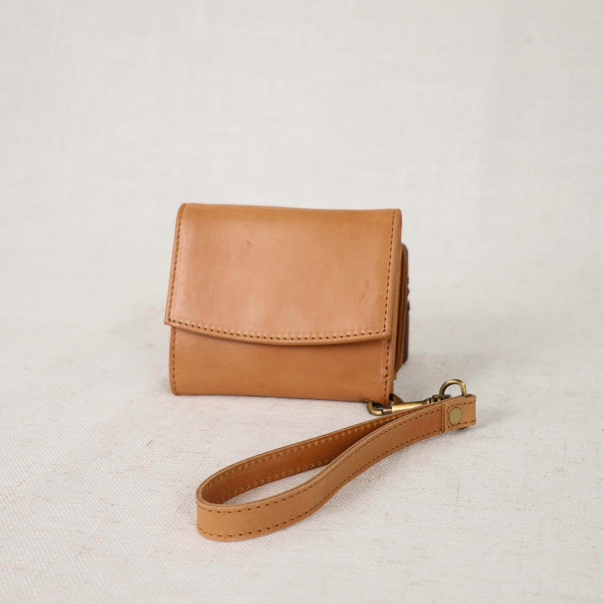Suri Wallet – Premium leather wallet with wristlet, perfect for stylish women seeking a functional leather wallet.