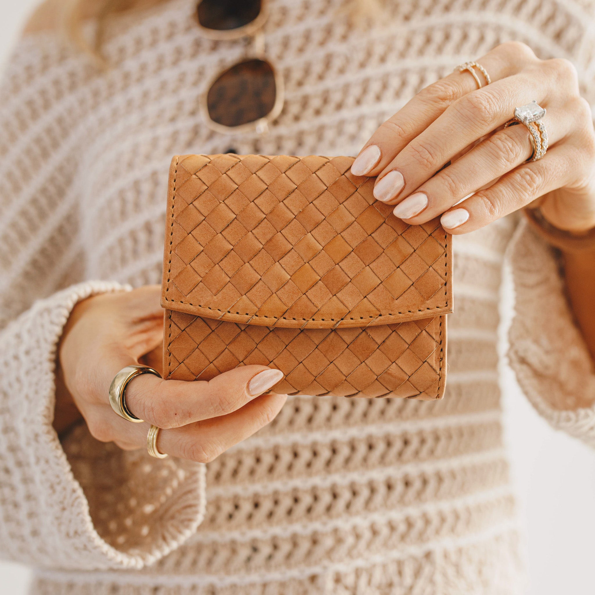 Close-up of the Suri Woven Leather Wallet's intricate weave, highlighting its quality craftsmanship.